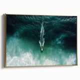 Framed canvas artwork depicting a serene beach landscape with golden accents, showcasing soft waves and a sunset sky, ideal for coastal-themed decor.