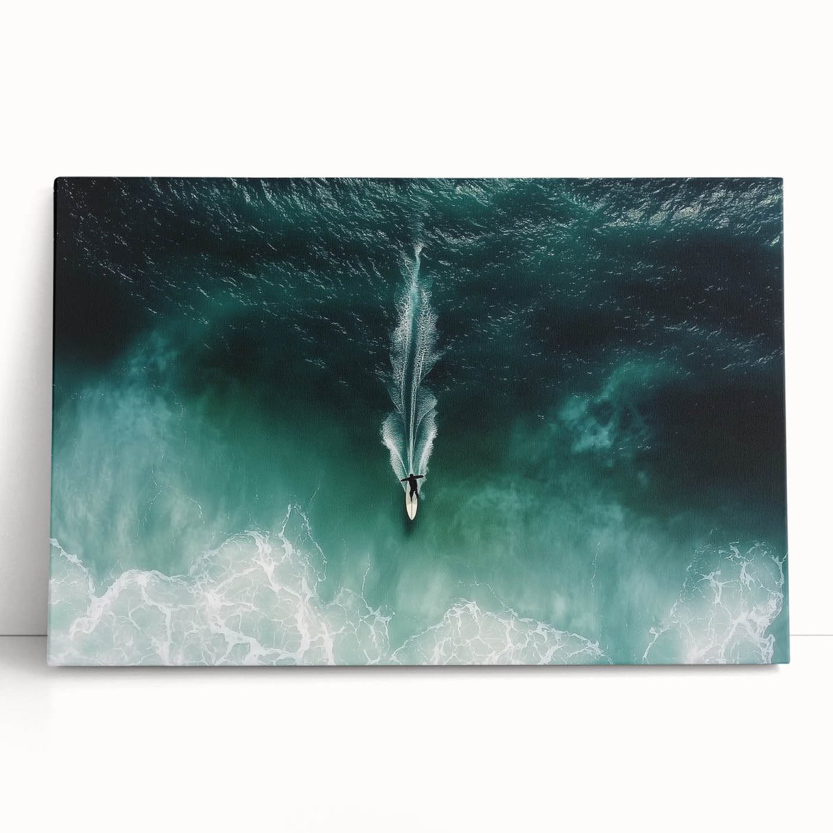 Stretched canvas artwork displaying a serene beach landscape with vibrant colors and gentle waves, perfect for coastal home decor or relaxation themes.