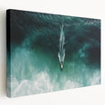 Stretched canvas artwork showcasing a vibrant beach landscape in warm tones, highlighting gentle waves and a serene sky, perfect for coastal-themed decor.