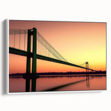 Framed canvas artwork showcasing a serene landscape view of a bridge, featuring a white frame and vibrant colors. Ideal for home decor and art enthusiasts.