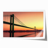 Stunning landscape bridge print on rolled canvas, showcasing vibrant colors and intricate details, securely packaged in a durable cardboard tube for easy transport.