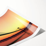 Landscape bridge rolled print showcasing vibrant colors and intricate details, elegantly displayed in a protective cardboard tube, perfect for home decor enthusiasts.