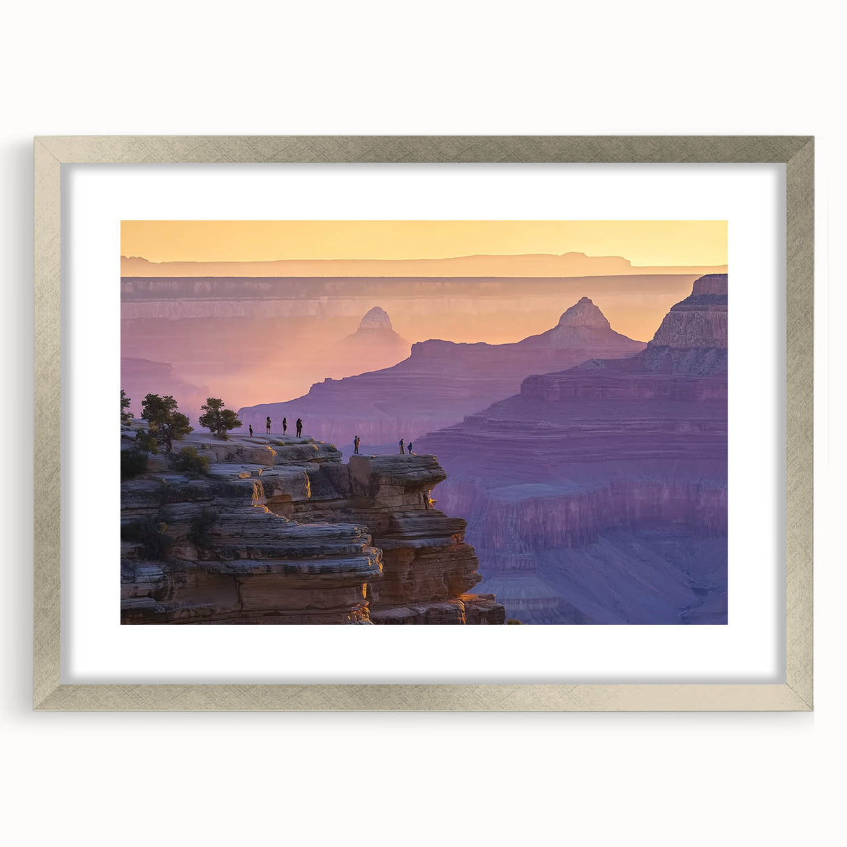 Elegant silver-framed landscape artwork depicting serene canyons, featuring a white matting that enhances the visual appeal, ideal for home decor and art enthusiasts.