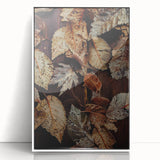 Art deco poster featuring stylized fall foliage in muted orange and gold tones, framed in white acrylic.
