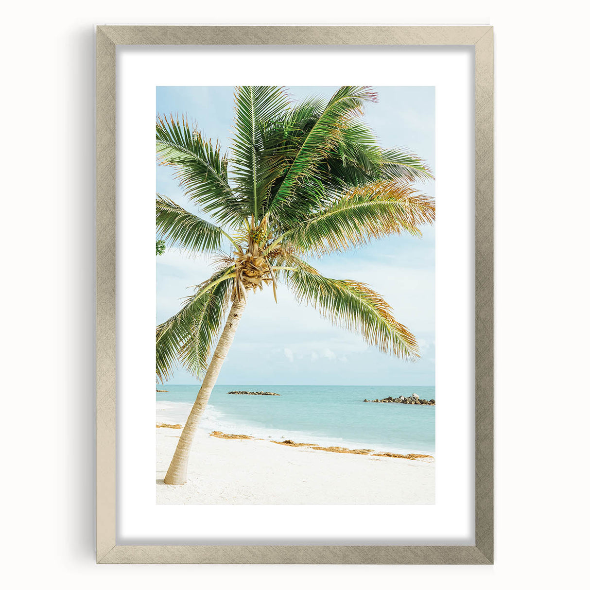 Textured abstract art print in silver frame with mat, featuring dynamic, swirling patterns in soft gray and white.