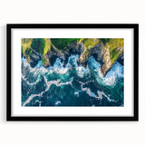 Black-framed landscape artwork showcasing dramatic cliffs under a vibrant sunset, elegantly matted for a polished finish, perfect for home decor enhancement.