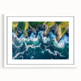 Framed landscape artwork depicting dramatic cliffs with a white mat, presenting a serene natural scene perfect for home decor and interior design aesthetics.