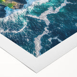 Stunning rolled canvas artwork depicting a dramatic cliff landscape under a vibrant sunset, ideal for home decor or office spaces, packaged securely in a protective tube.