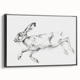 Framed canvas artwork showcasing a vibrant animal design, displayed from the side, featuring a sleek black frame that enhances its modern aesthetic.