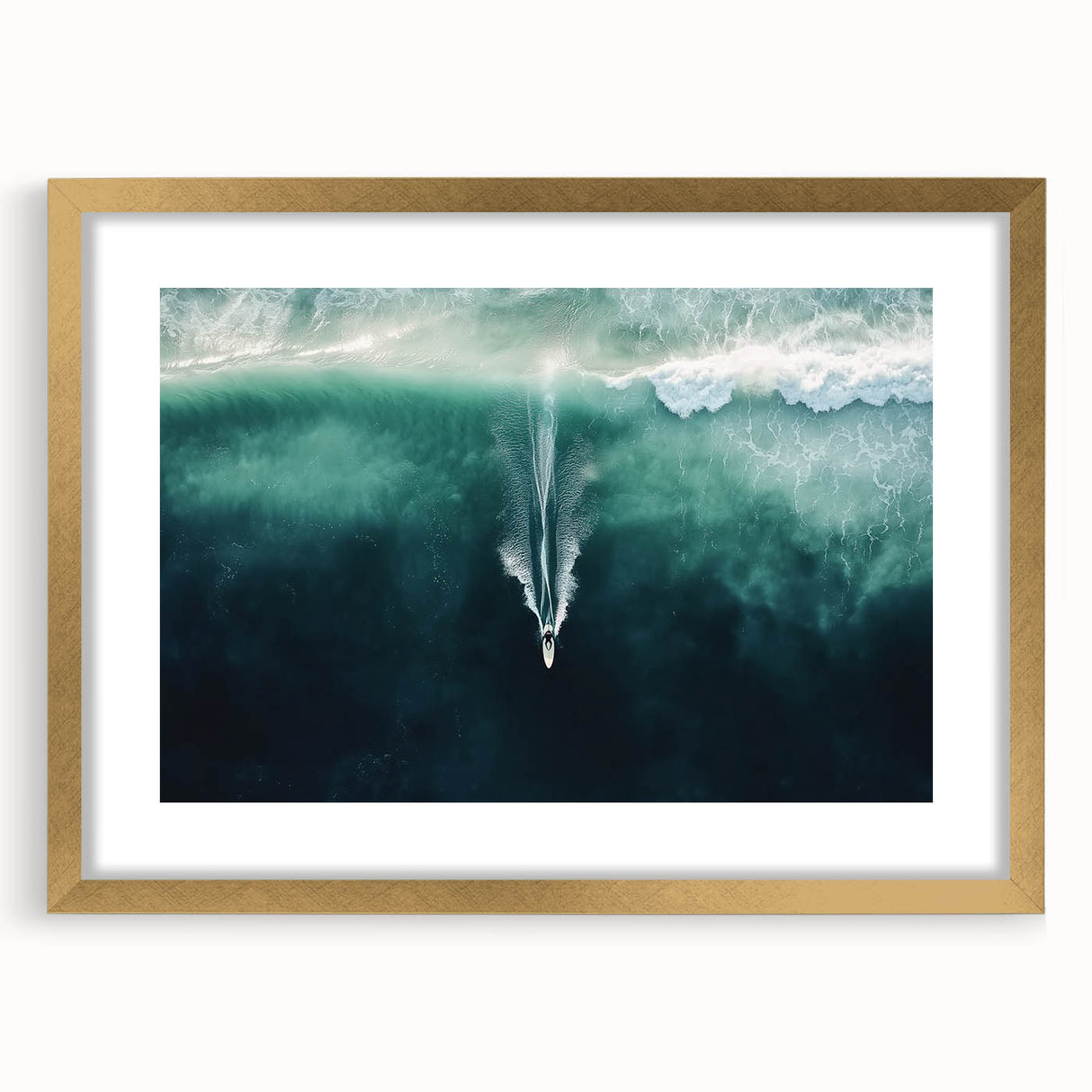 Framed landscape artwork showcasing a serene beach scene, featuring golden accents and a white mat, perfect for coastal-themed home decor.