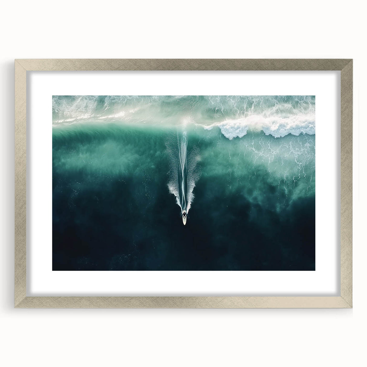 Landscape artwork featuring a serene beach scene framed in a sleek silver mat, showcasing vibrant colors and fine details. Ideal for coastal home decor.
