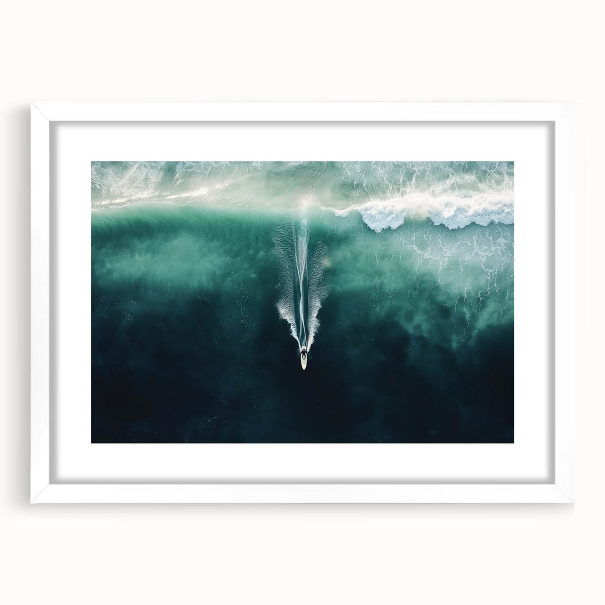 Landscape artwork featuring serene beach scene with soft waves and golden sand, framed in a sleek white mat, perfect for coastal home decor. Ideal for enhancing living spaces with a touch of tranquility and elegance.
