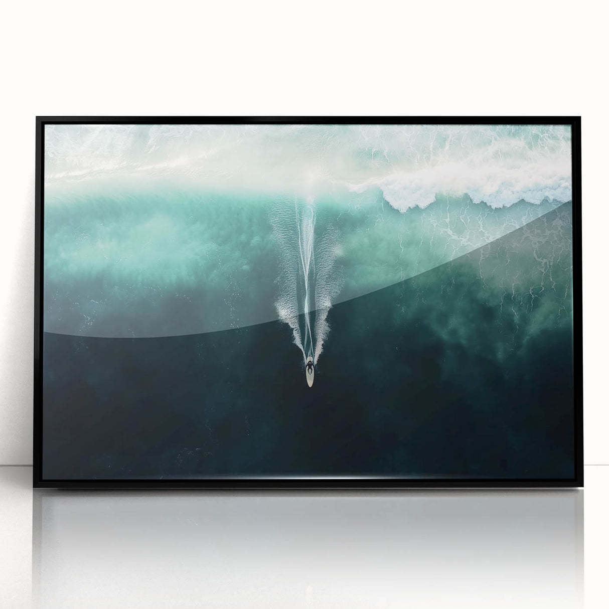 Framed acrylic artwork depicting a serene landscape of tropical beaches, showcasing vibrant blue waters and golden sands, with a sleek black frame for modern decor.