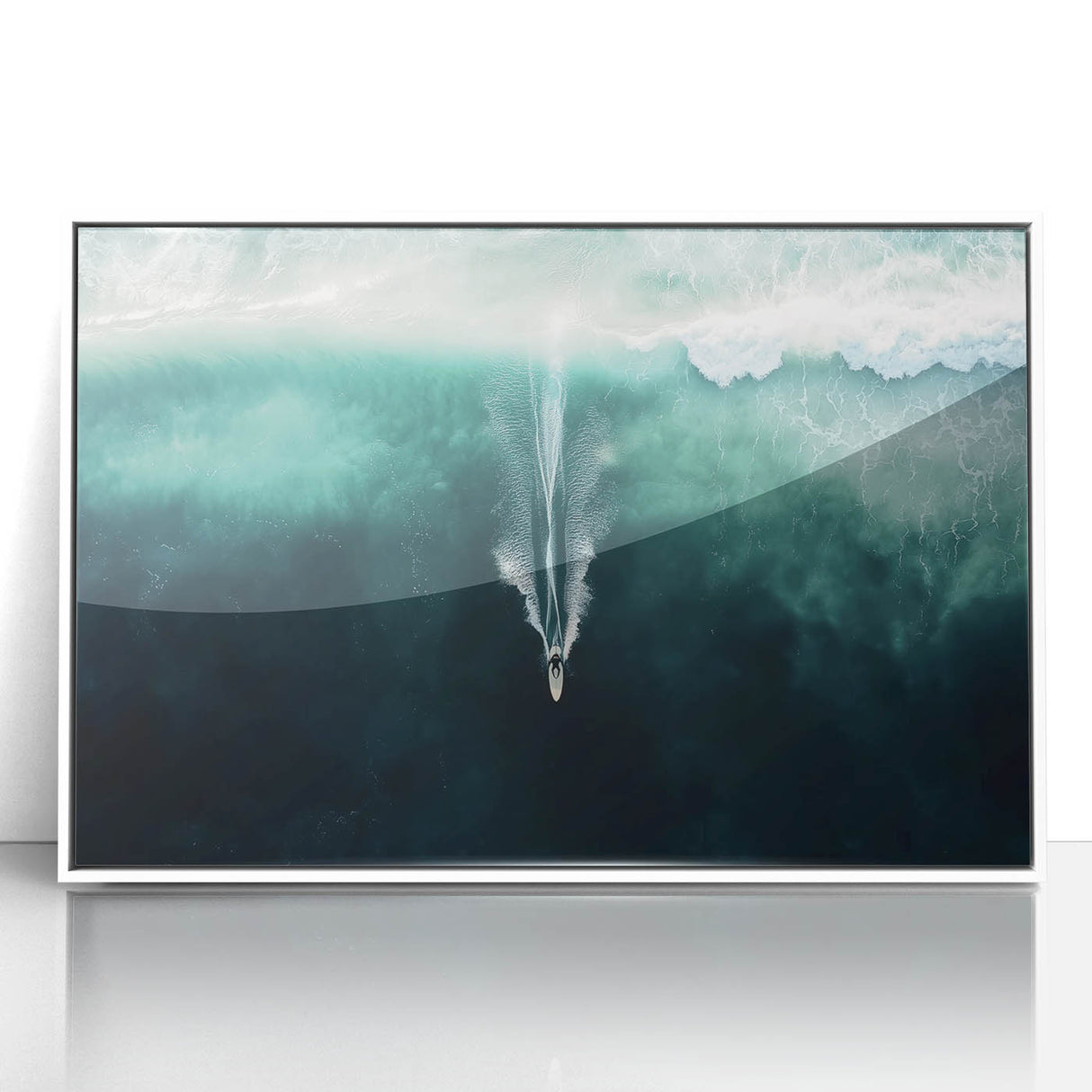 Framed acrylic artwork showcasing a serene beach landscape, featuring soft blue skies and gentle waves, presented in a sleek white frame for a modern aesthetic.