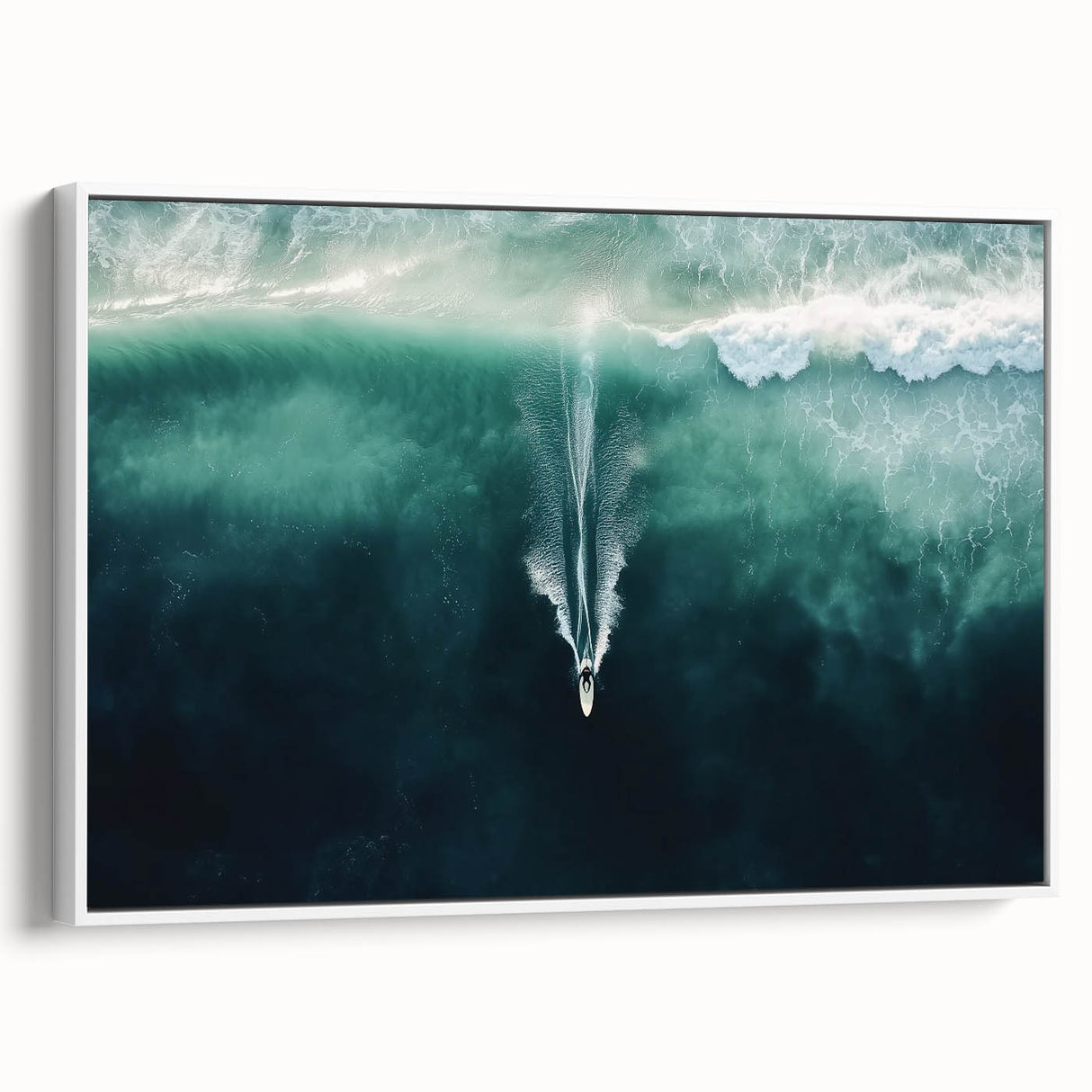 Framed canvas artwork displaying a serene beach landscape with soft pastel colors, featuring gentle waves and a clear sky, perfect for coastal home decor.