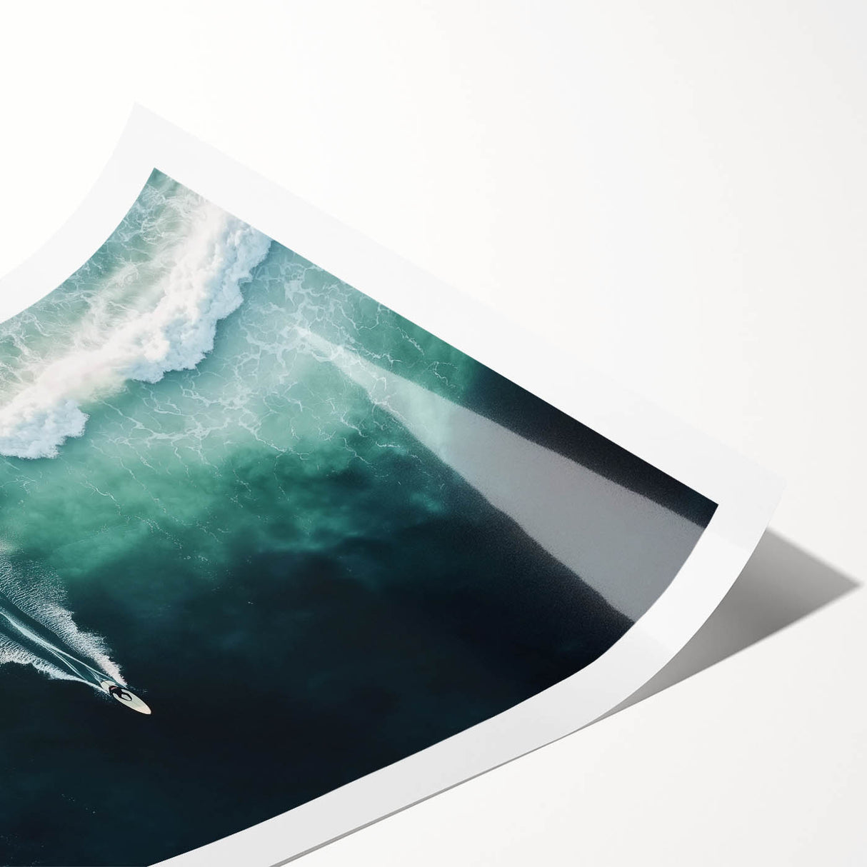 Landscape canvas print showcasing a serene beach scene with gentle waves and soft golden sand, rolled and secured in a protective cardboard tube for safe shipping. Ideal for coastal-themed decor.