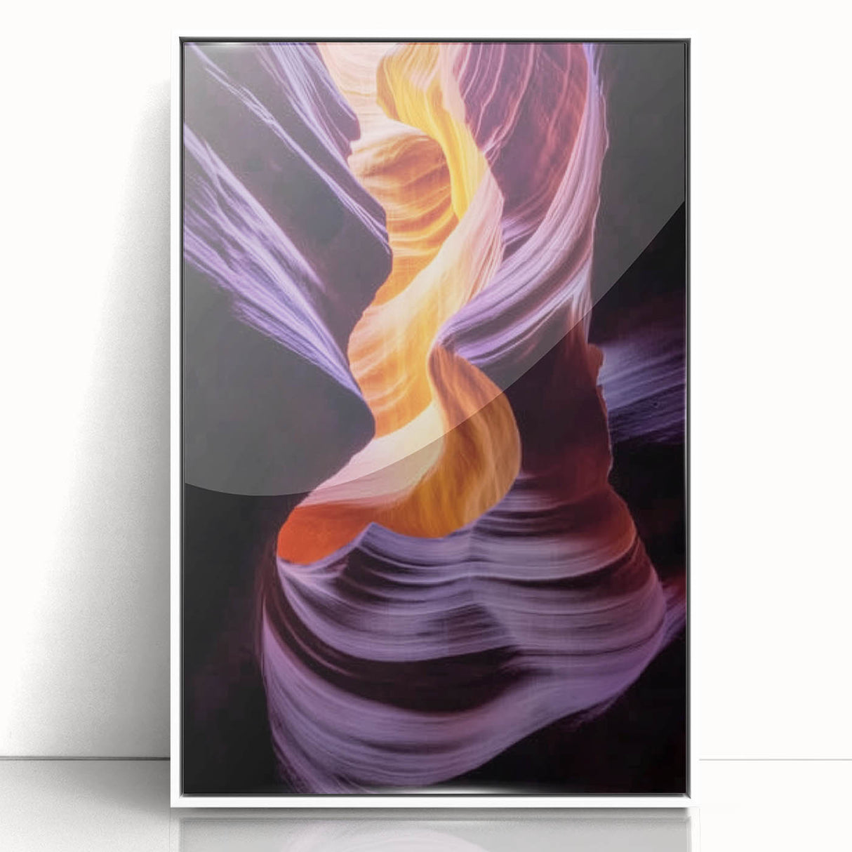Framed acrylic artwork showcasing a stunning landscape of canyons in vibrant hues, featuring a sleek white frame that enhances the modern aesthetic for home decor.
