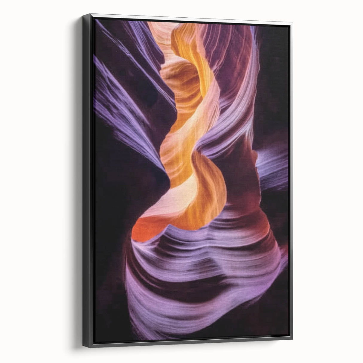 Framed canvas artwork showcasing a breathtaking landscape of canyons in vibrant colors, set against a sleek black frame, perfect for enhancing modern home decor.
