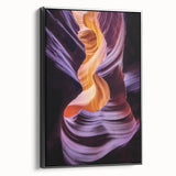 Framed canvas artwork showcasing a breathtaking landscape of canyons in vibrant colors, set against a sleek black frame, perfect for enhancing modern home decor.