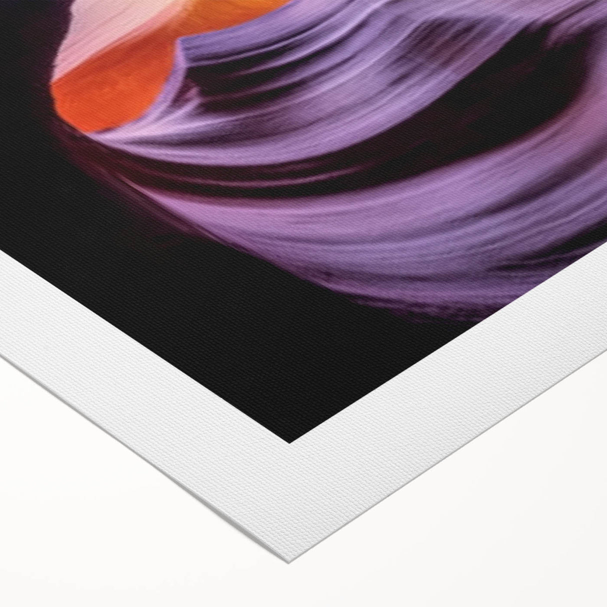 Landscape canvas print showcasing vibrant canyons with rich earthy tones and dramatic textures, rolled for easy shipping and display in any home decor.