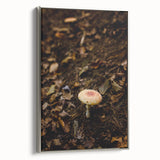 Framed canvas featuring a vintage landscape art painting of a fall scene with vibrant orange and red leaves.