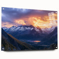Acrylic landscape artwork depicting dramatic cliffs in vibrant hues, displayed in a sleek glass frame with pins for hanging, perfect for modern decor.