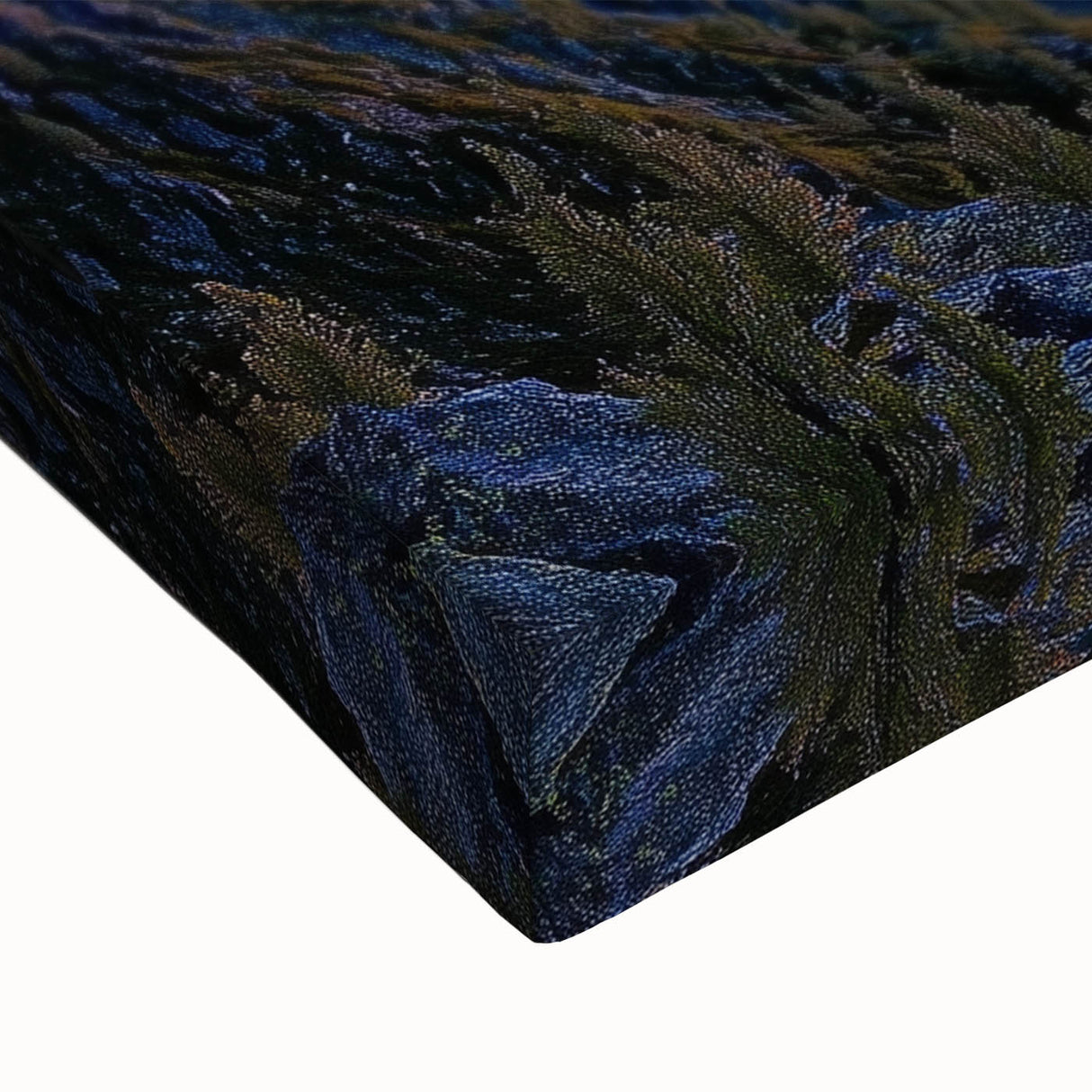 Close-up of a stretched canvas artwork depicting dramatic cliffs and vibrant landscapes, showcasing rich colors and intricate details, ideal for home decor.