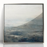 Framed abstract landscape wall art featuring vibrant blues and greens, presented in a sleek silver frame, ideal for modern home decor enhancements.