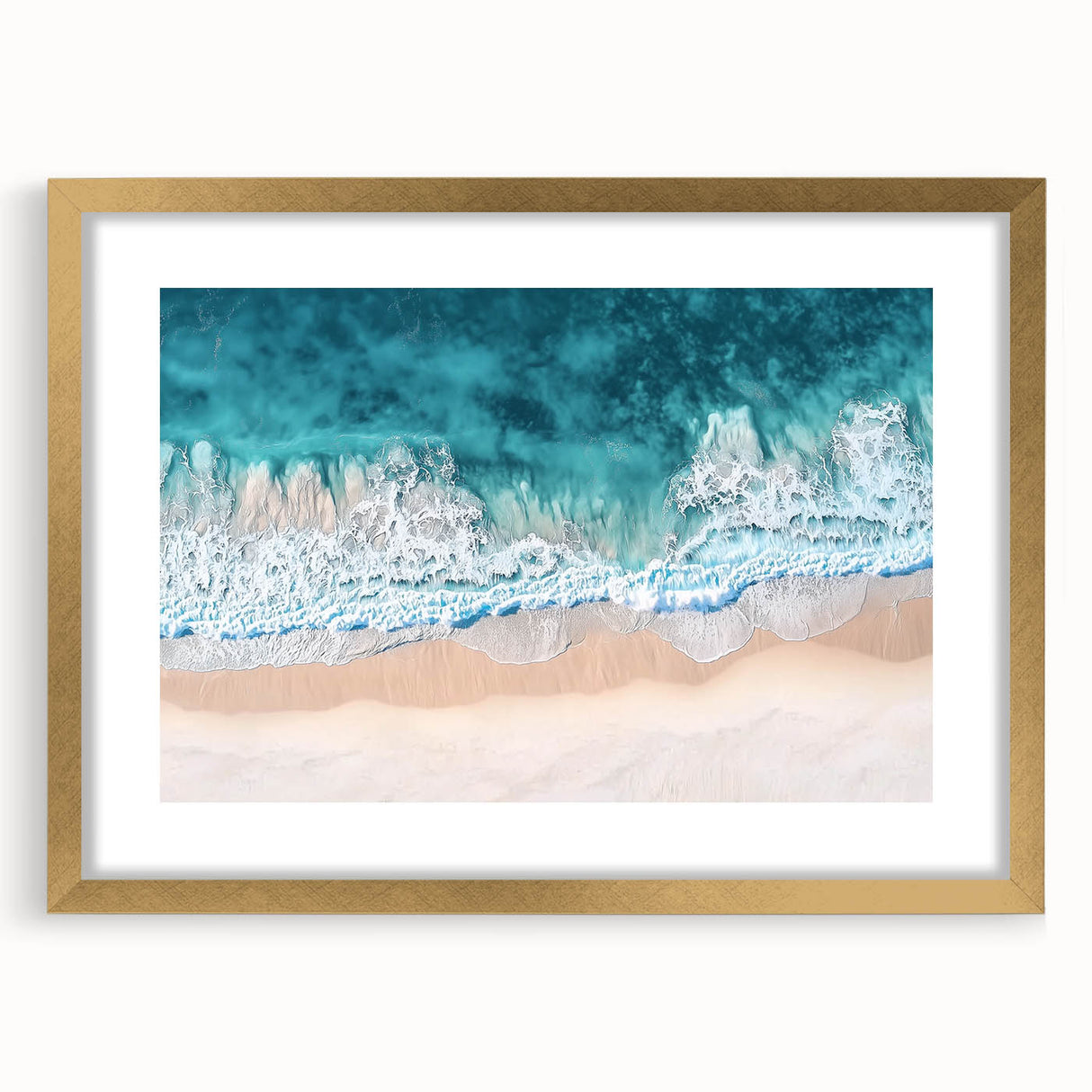 Elegant landscape print of a serene beach scene framed in a gold mat, showcasing soft sand and gentle waves, perfect for coastal home decor. Ideal for enhancing living spaces with a tranquil atmosphere.