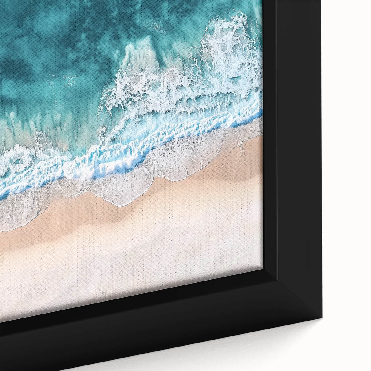 Framed canvas artwork depicting a serene beach landscape, showcasing vibrant blues and sandy tones, perfect for coastal-themed decor in living spaces.