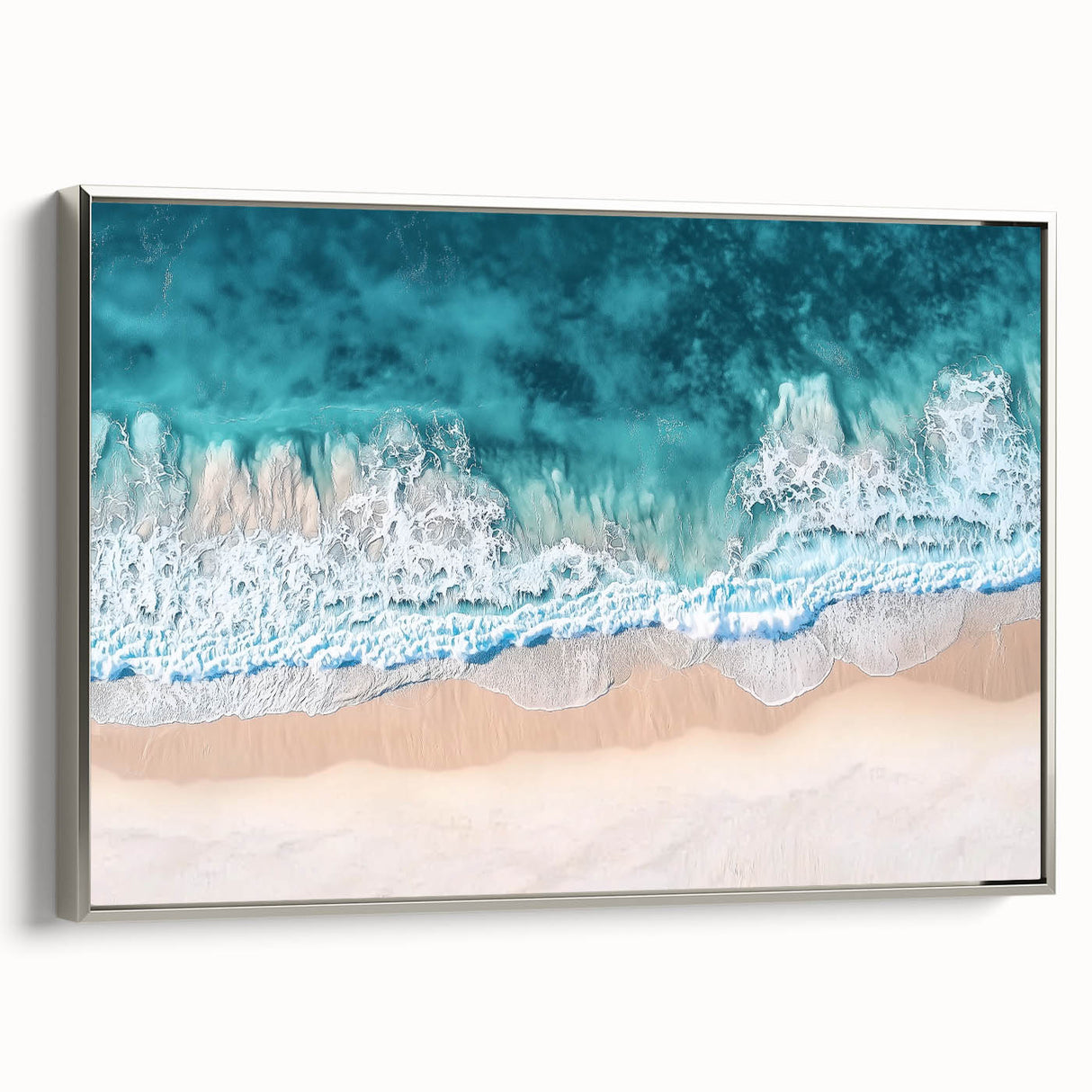 Framed landscape canvas artwork showcasing serene beach scene with silver trim, adding elegance to home decor. Perfect for coastal-themed interiors.