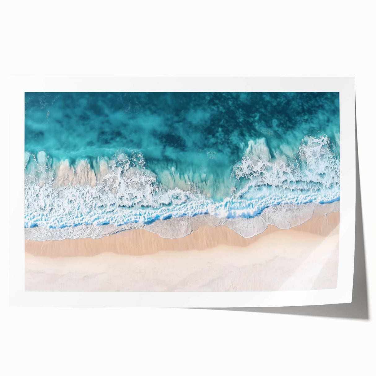Vibrant rolled print showcasing a serene beach landscape with gentle waves and golden sand, ideal for coastal decor, packaged securely in a protective tube.