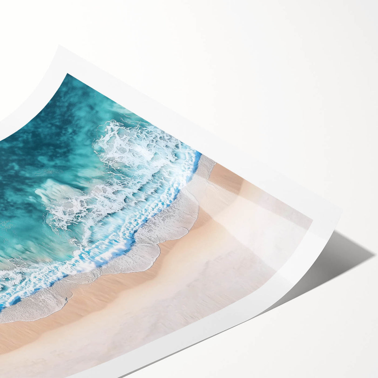 Landscape print showcasing a serene beach scene with gentle waves and a vibrant sunset, rolled and packaged securely in a protective tube for art enthusiasts.