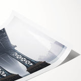 Landscape art print of a serene bridge scene, rolled and ready for display, showcasing vibrant colors and intricate details, packaged securely for protection during shipping.