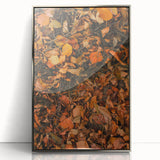 Mid-century modernist art depicting autumn trees in orange and gold tones, framed in silver acrylic.