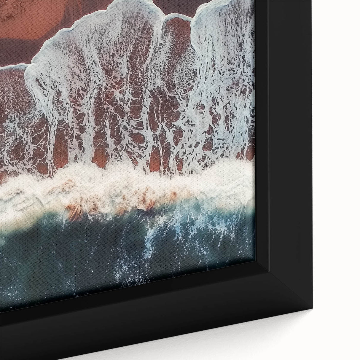 Close-up of a vibrant landscape canvas print showcasing serene beaches with soft waves and golden sands, elegantly framed for home decor enhancement.