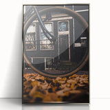 Mid-century modernist art depicting an autumn scene in muted orange and brown tones, framed acrylic.