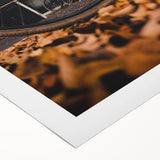 Art deco poster featuring a stylized autumn scene in warm orange and brown tones on rolled canvas.