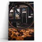 Large black and white abstract art on stretched canvas depicting swirling patterns.