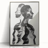Framed abstract figurative art piece with silver accents, showcasing dynamic shapes and colors, perfect for modern home decor. Ideal for artistic interior styling.