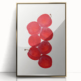 Large art print of assorted fruits in vibrant colors on a gold-framed acrylic, ideal for modern kitchen decor.