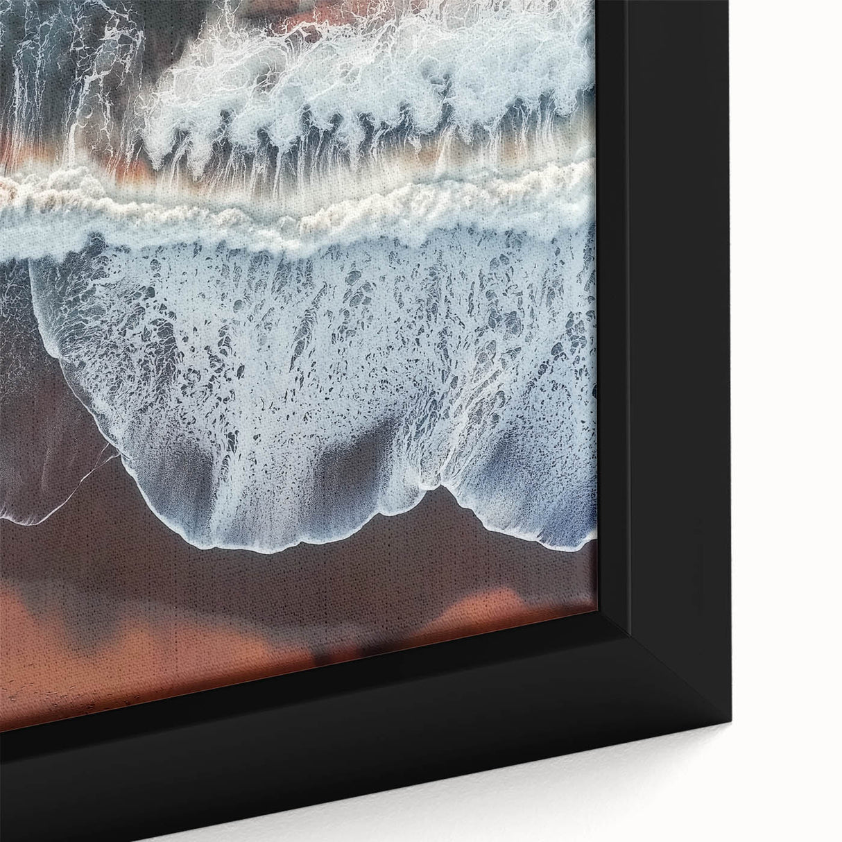 Close-up of a framed landscape canvas depicting serene beaches at sunset, showcasing vivid colors and intricate details, perfect for coastal home decor.