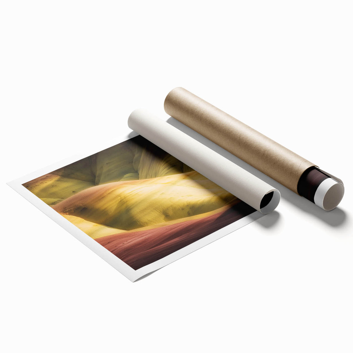 Stunning landscape print of vibrant canyons in rich earth tones, showcasing intricate details and textures, rolled and ready for display in a protective tube.