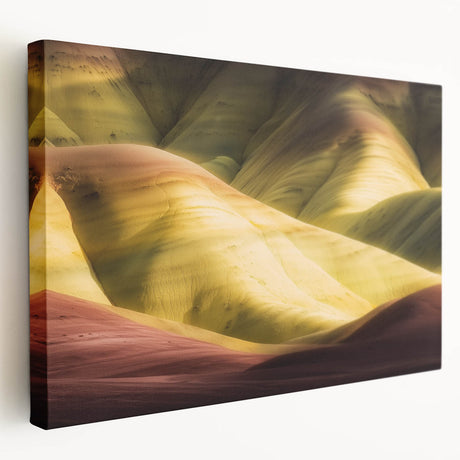 Stretched canvas art depicting a stunning landscape of colorful canyons, showcasing vibrant hues of orange and purple under a clear blue sky, perfect for home decor.