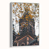 Vintage poster art of an autumnal scene in bold colors on a large framed canvas, ideal for living room decor.