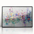 Framed acrylic artwork showcasing an abstract design with vibrant splatters in black and colorful hues, perfect for modern home decor and art enthusiasts.