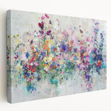 Abstract splatter art canvas featuring vibrant colors and dynamic patterns, showcasing a side view of the stretched design ideal for modern home decor.
