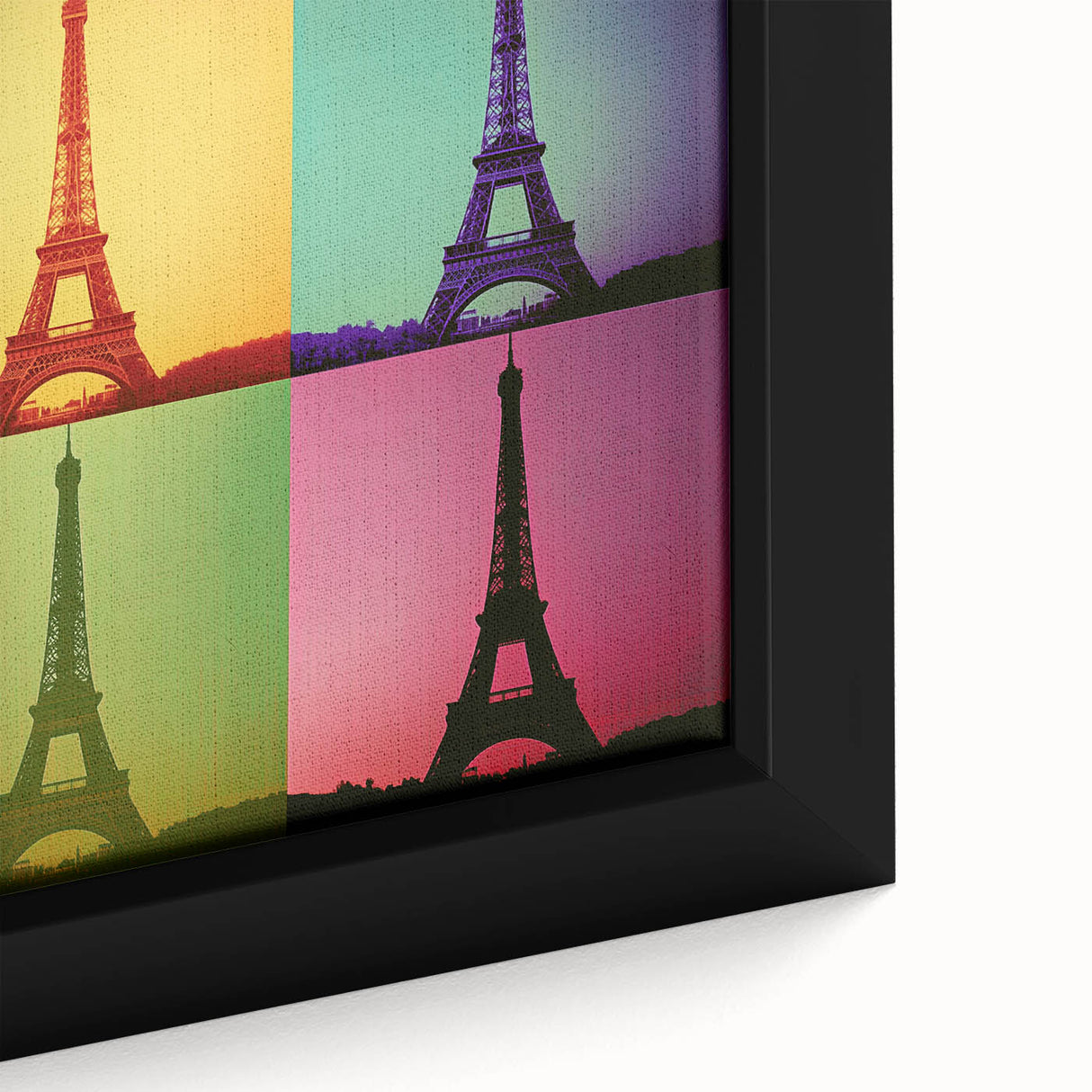 Close-up of textured black wall art featuring a colorful abstract design on a framed canvas.