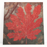 Vibrant stretched canvas wall art showcasing a beautiful design of colorful flowers and botanical leaves, elegantly leaning against a neutral wall, perfect for modern home decor.