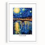 Abstract art print depicting a swirl pattern in vibrant blues and yellows on a white framed canvas.